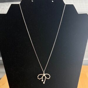 Elegant Silver Tone Bow Pendant Necklace